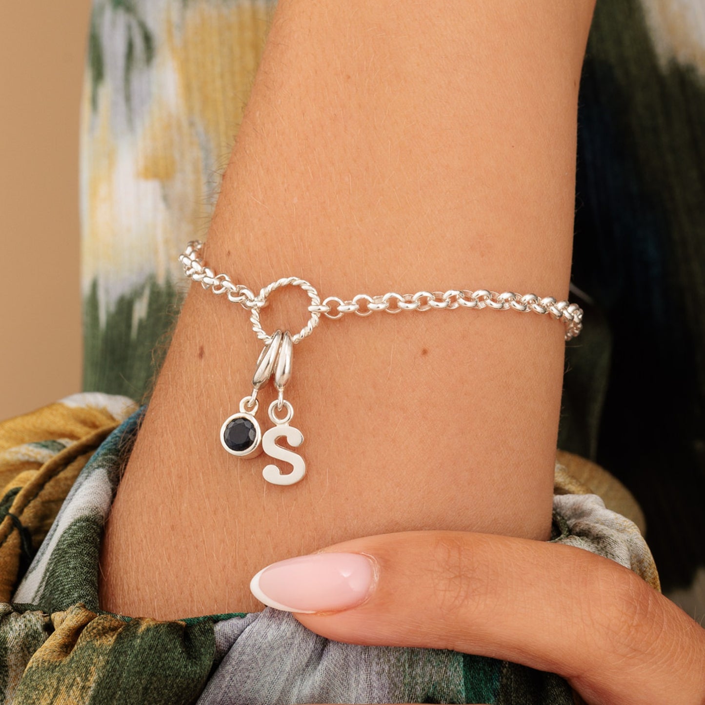 Silver Eternity Twist Charm Bracelet