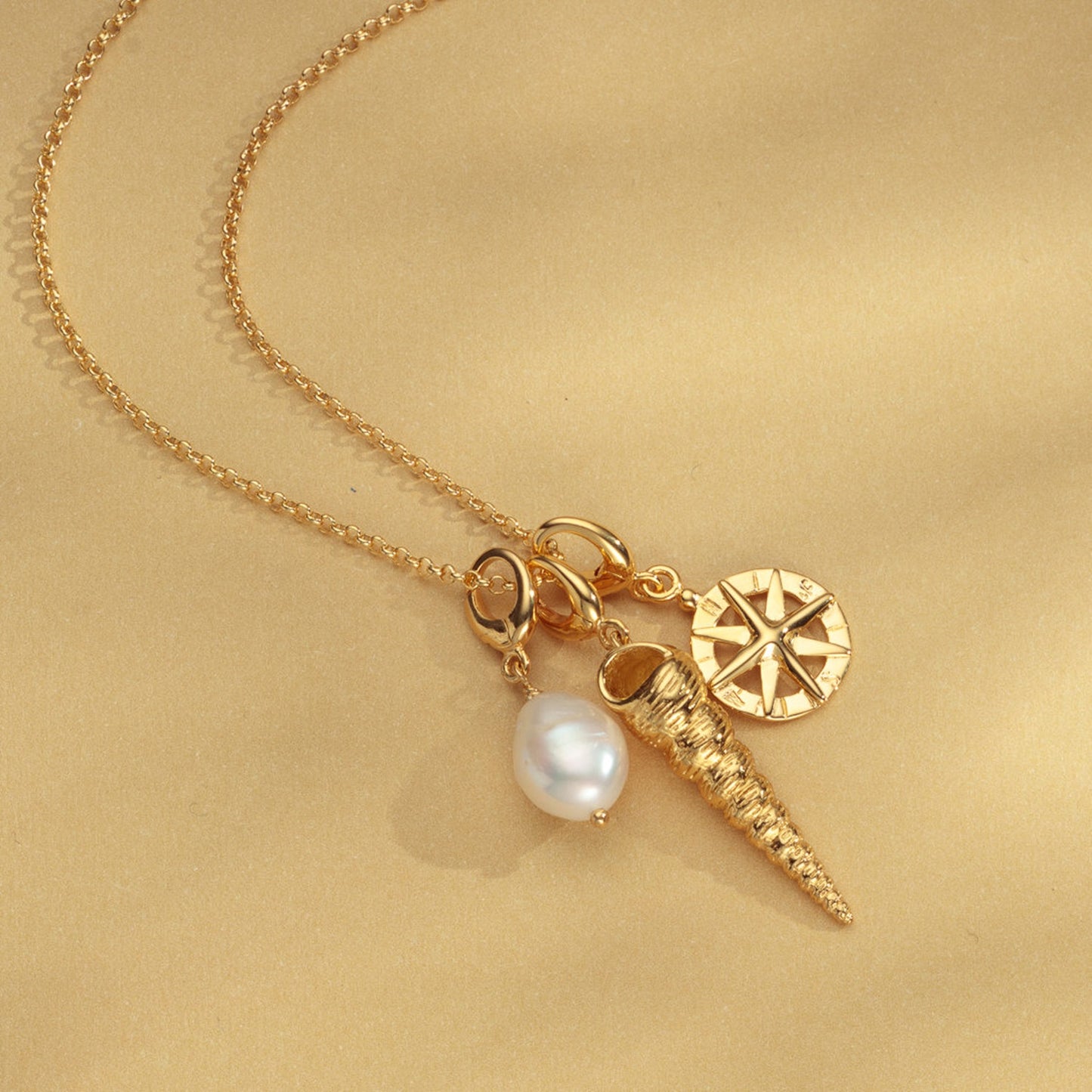 Gold Plated Spire Shell Charm