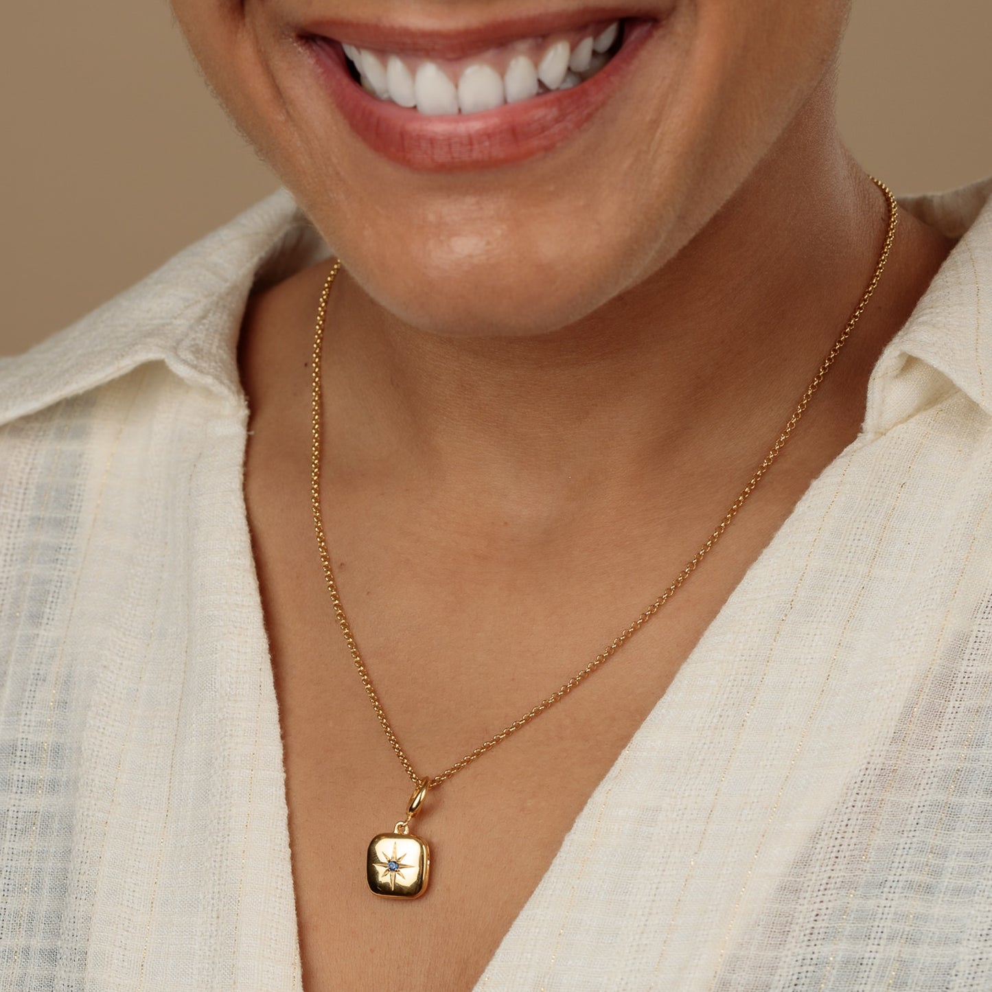 Gold Star Locket Charm with Blue Stone
