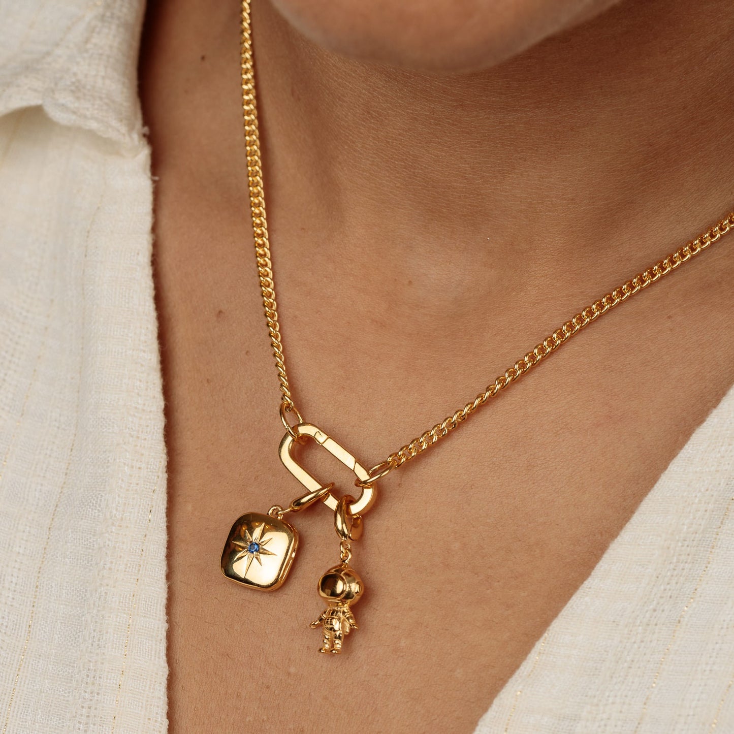 Gold Star Locket Charm with Blue Stone