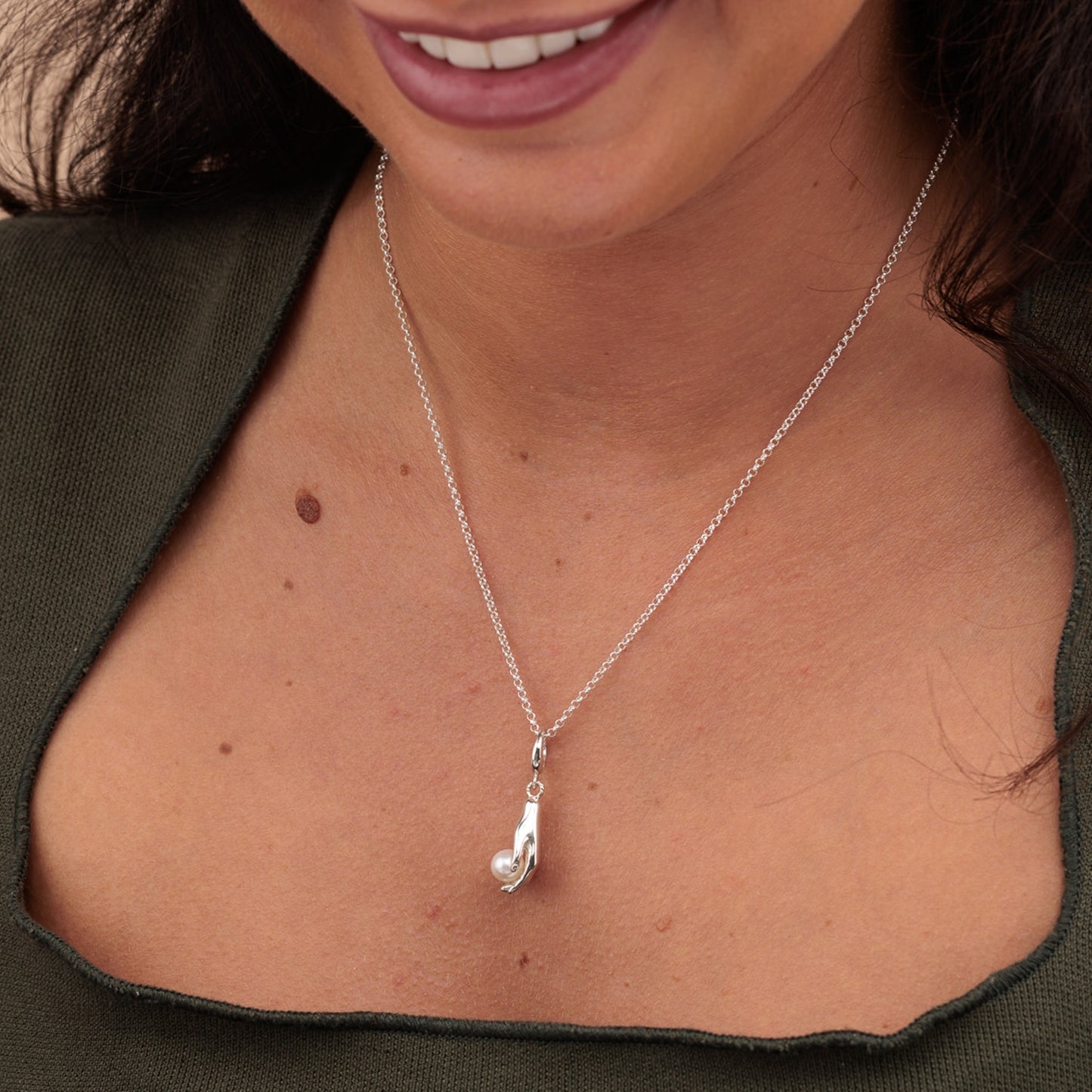 Silver Hand and Pearl Charm