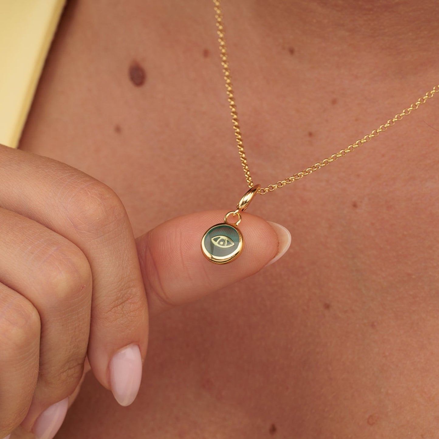 Gold Plated Turquoise Eye Resin Capture Charm
